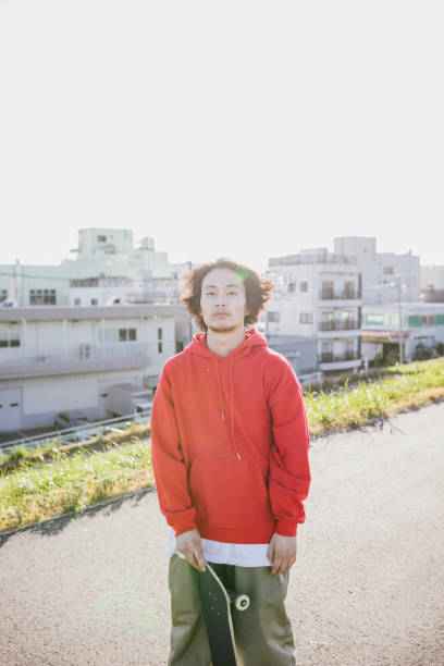 istock Portrait of Asian Skateboarder 1204236111