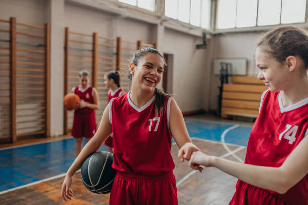 istock Female School Basketball Team 1204236301