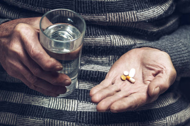 istock The pills in a Senior's hands 1204241775