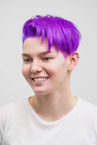 Portrait Of A Young Attractive Woman In A White Tshirt On A White  Background Purplecolored Short Hair Stock Photo - Download Image Now -  iStock