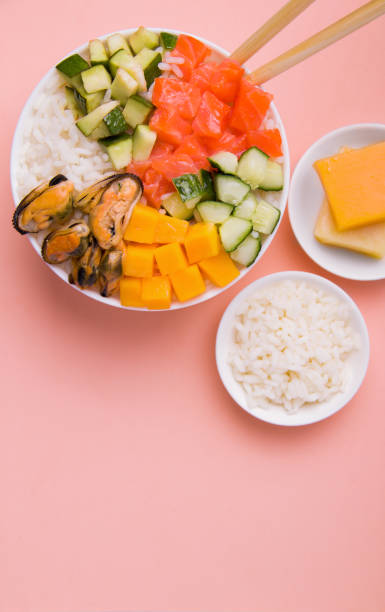 istock poke salad on a pink background copy space 1204244796
