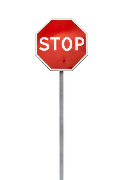 istock Classical Stop road sign on a metal pole isolated 1204246739