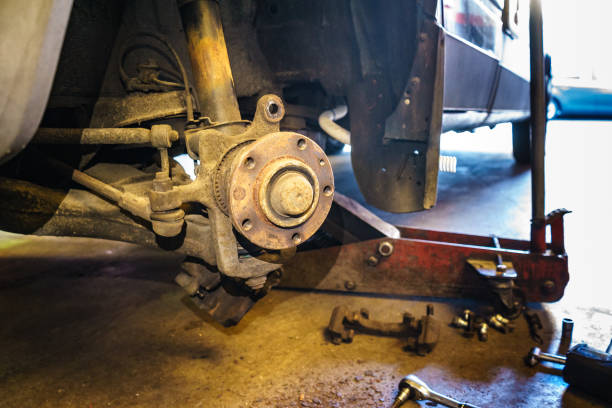istock Auto repair. Brake change 1204251387