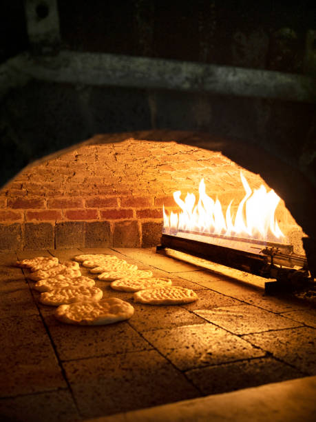 istock pitta bread in a Brick Oven, Brick Oven,stone oven, 1204256349