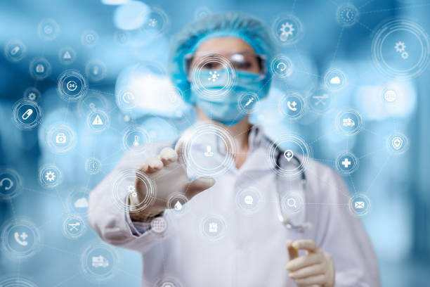 istock Doctor works on a virtual screen with medical icons. 1204256382