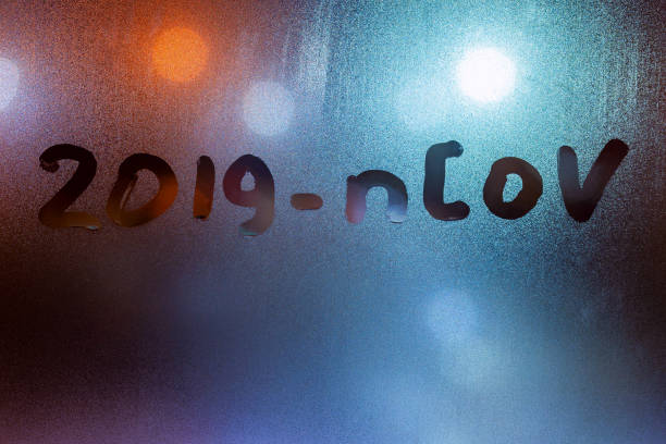 istock the word 2019-nCoV handwritten on sweat window glass surface at night 1204257717