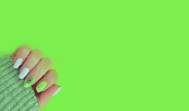 female hand beautiful manicure stylish sweater