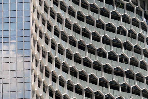 honeycomb architecture honeycomb architecture in a Singapore skyscraper. Office building honeycomb pattern photos stock pictures, royalty-free photos & images