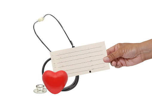 Red heart, Stethoscope and hand holding EKG on white background