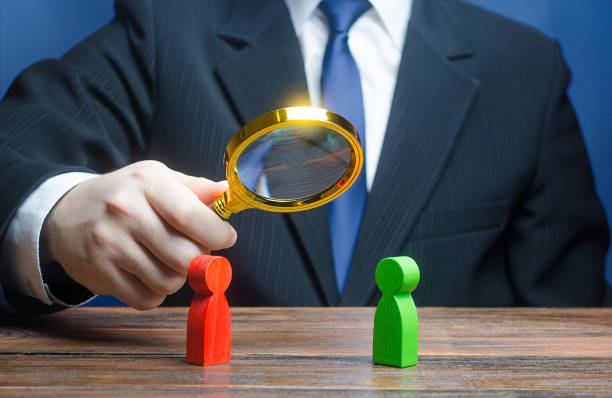 istock A man is studying confrontation of two persons. Establishing contact. Peaceful resolution disputes, search for compromise. Truce agreement. Lawsuit, court trial. Make a deal. Finding dispute solution 1204262923