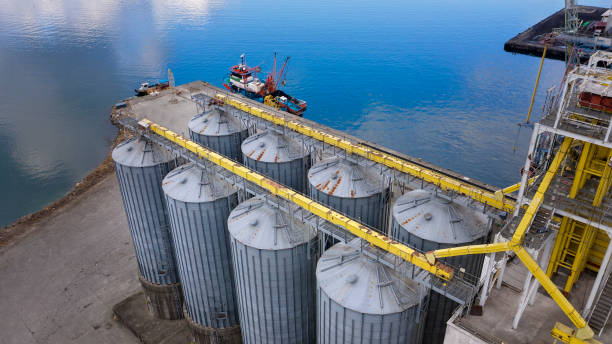 istock Aerial view of silos in a port. 1204265996