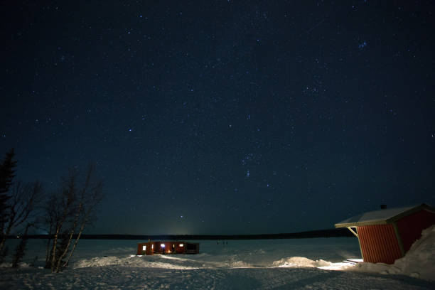 A sky full of stars Camp Alta, Kiruna, Lapland, Sweden. Without light pollution, the sky at night looks stunning. swedish sauna stock pictures, royalty-free photos & images