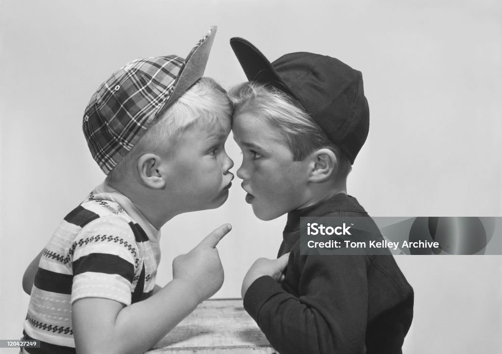 Two boy arguing, close-up  Arguing Stock Photo