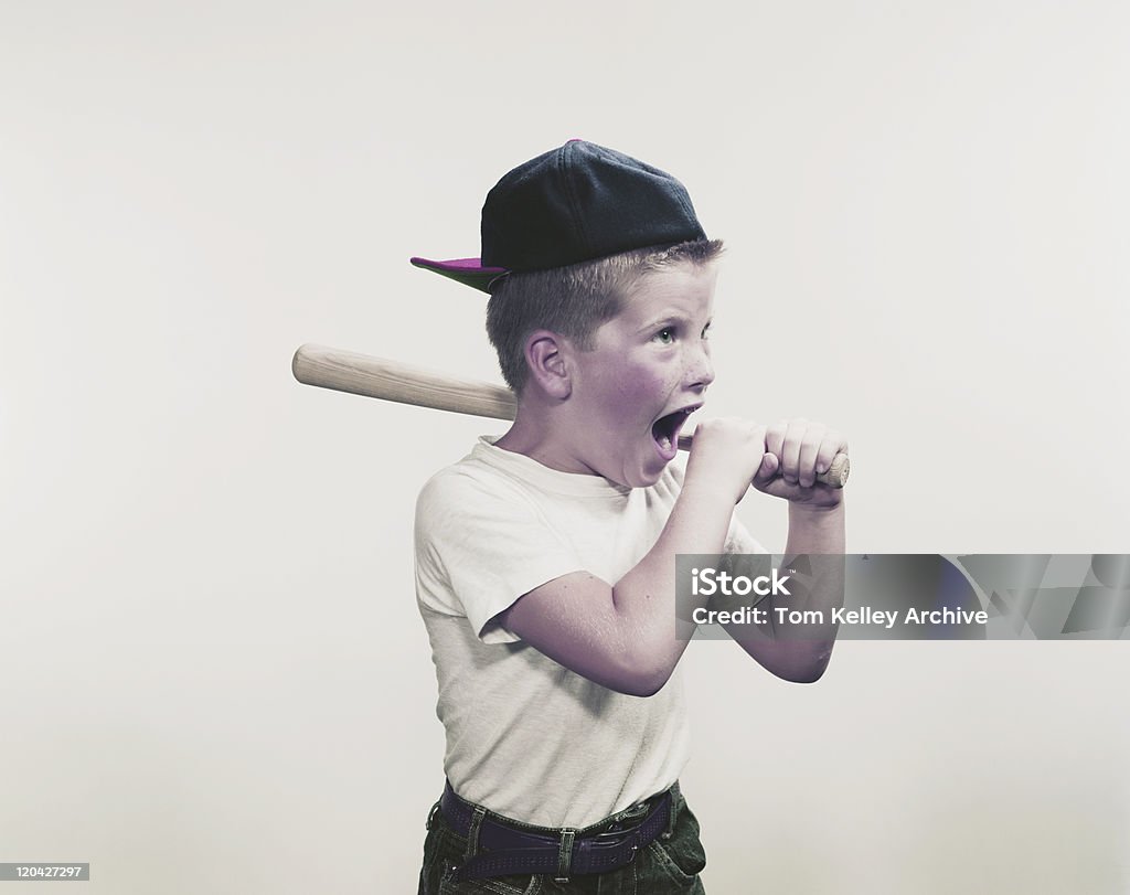 Boy shouting and holding baseball bat   Archival Stock Photo