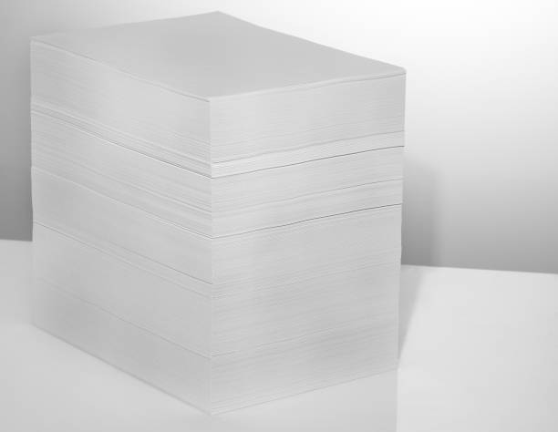 istock Stack of office paper, on a white background. Concept, minimalism 1204274265