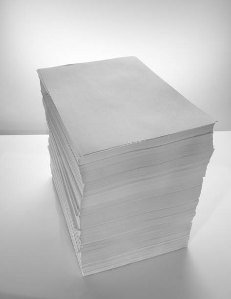 istock Stack of office paper, on a white background. Concept, minimalism 1204274300