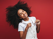 istock Beautiful smiling girl with curly hairstyle 1204274304