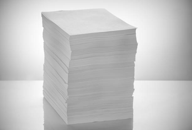 istock Stack of office paper, on a white background. Concept, minimalism 1204274327