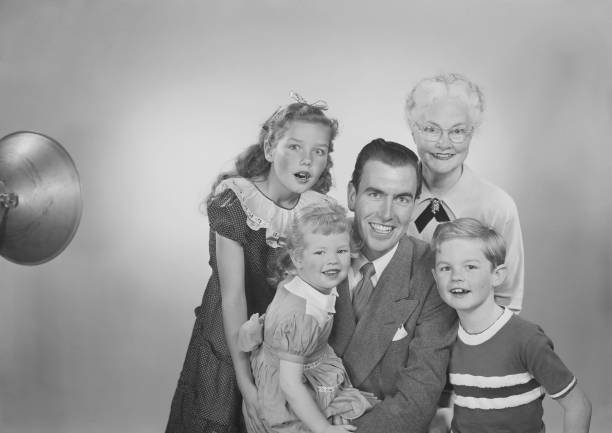 Family against white background, smiling, portrait  1968 stock pictures, royalty-free photos & images