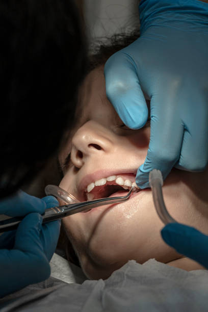 istock Child having a dental filling operation. 1204276075