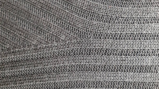 istock Knitted dark texture. Modern abstract pattern. Photo material yarn, background color 1204276143