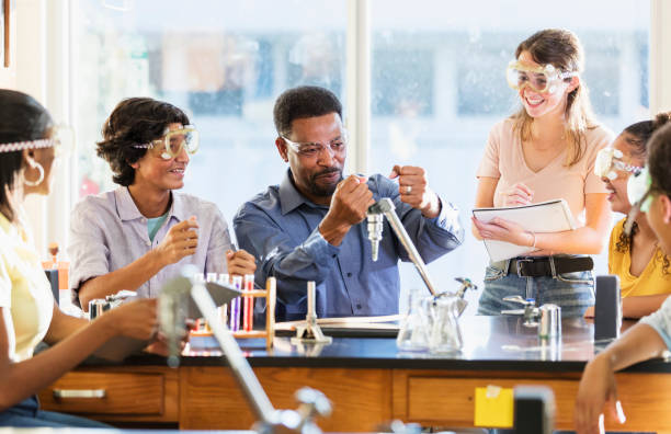istock African-American man teaching high school chemistry lab 1204276420
