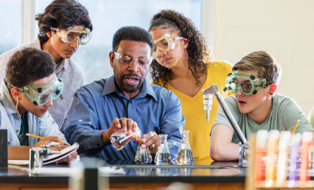 istock African-American man teaching high school chemistry lab 1204277126