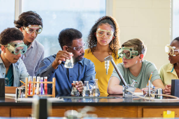 istock African-American man teaching high school chemistry lab 1204277194