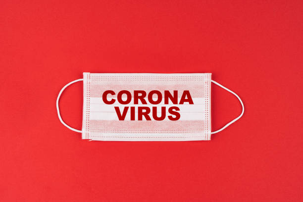 istock Corona virus, lassa virus isolated needle medication red background 1204277376