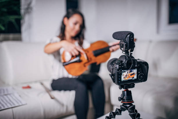 istock Violinist Woman Vlogging 1204277874
