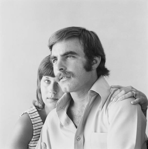 Young woman leaning head on man's shoulder  1971 stock pictures, royalty-free photos & images