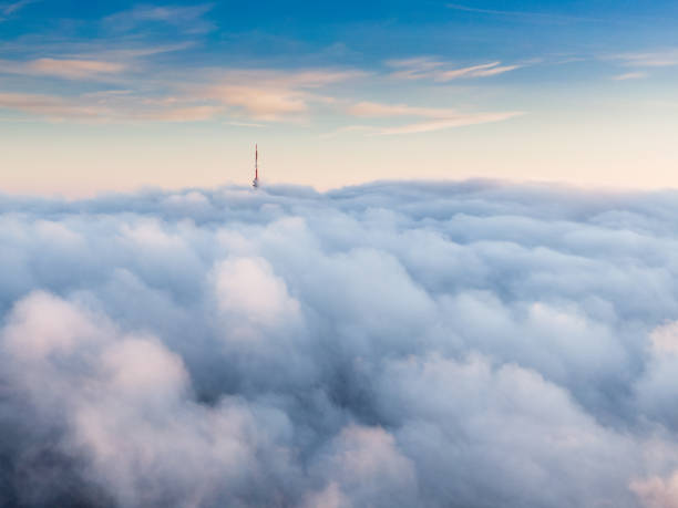 istock TV tower with foggy sky 1204280146