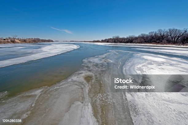 Colorful Ice And Water In The Late Winter Stock Photo - Download Image Now - Kearney - Nebraska, Nebraska, Beauty
