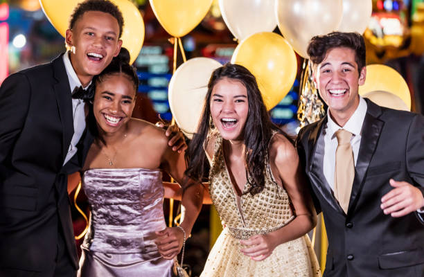 istock Teenagers having fun at prom 1204280531