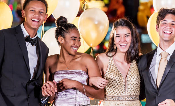 istock Teenagers having fun at prom 1204280648