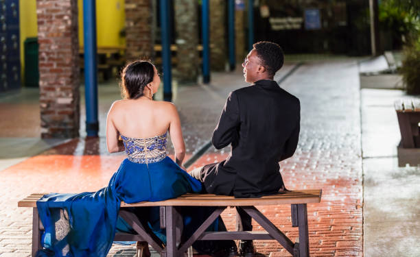 istock Multi-ethnic teenage couple at prom, talking 1204280976