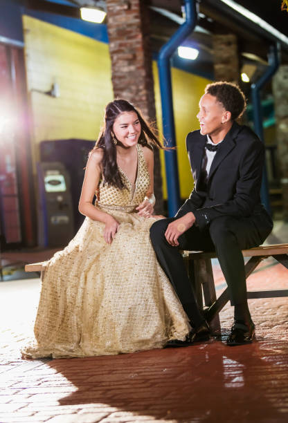 istock Multi-ethnic teenage couple at prom, talking 1204281912