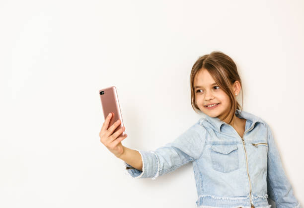 istock Girl takes selfie. 1204283449