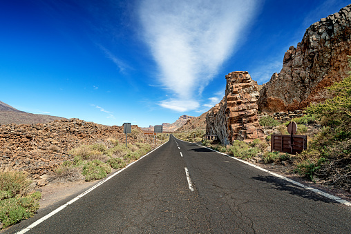 Asphalt road in high mountains near Teide Volcano at Tenerife Island