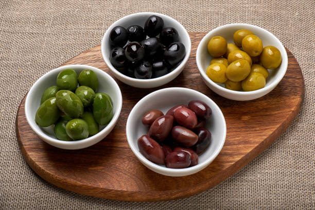 istock Four kinds of olives in bowls 1204284495