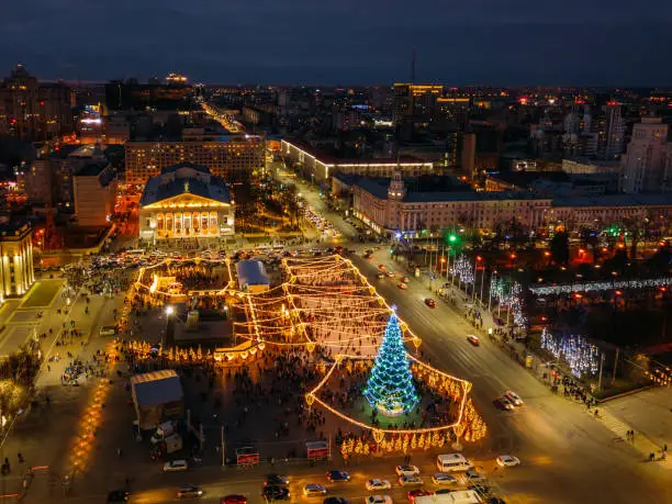 Street illumination during new year celebration in central square of Lenin in Voronezh, Russia, aerial view.