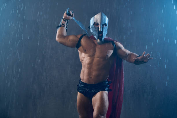 istock Muscular screaminng spartan attacking. 1204288231