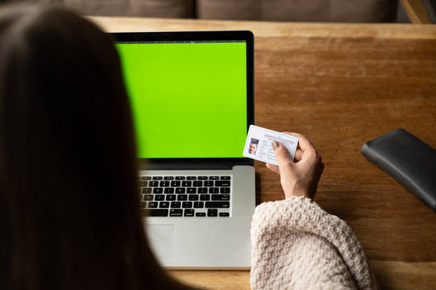 istock Young woman using laptop in a coffe shop. 1204289713