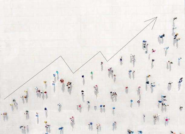 Crowd from above forming a growth graph Crowd from above forming a growth graph stock market data photos stock pictures, royalty-free photos & images