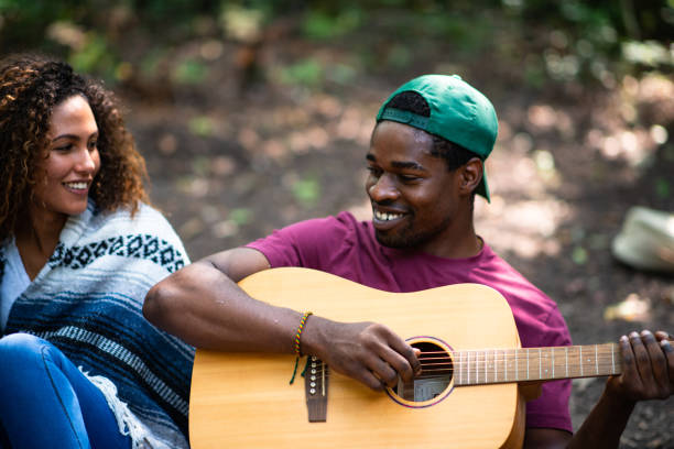 istock Multi-Ethnic Campfire Sing-A-Long stock photo 1204292252
