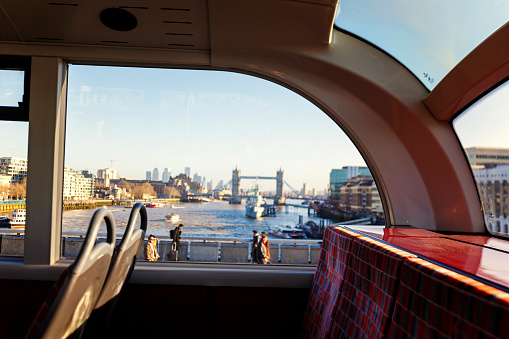View of Tower Bridge from inside a new London Double-decker bus