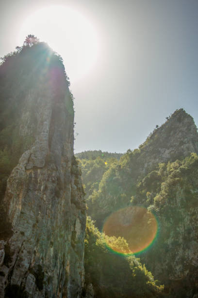 istock Scenic view of mountain range at sunrise 1204296075