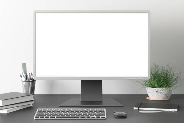 istock Workspace with blank computer monitor screen mock up. 1204299457
