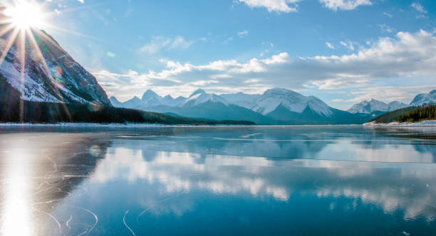 istock Scenic view of mountain range at sunrise 1204299704