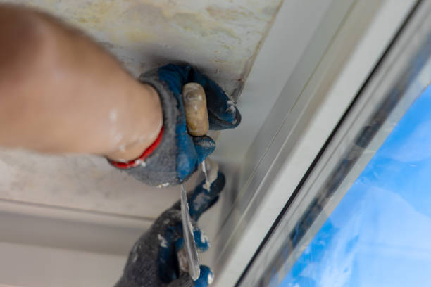 istock Handyman installing glass windows on terrace and carpentry work 1204312208